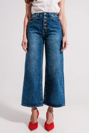 Wide leg jeans with exposed buttons